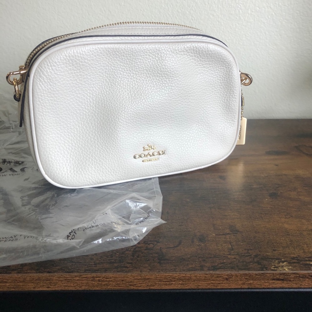 Coach - small cross body bag - white leather